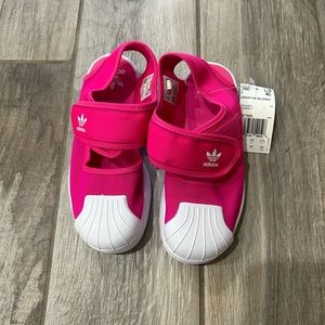 Pink open heel/closed toe shoes